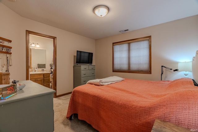 17 Chrysler Ave, Wabash, IN 46992 - bedroom featuring light colored carpet and ensuite bathroom