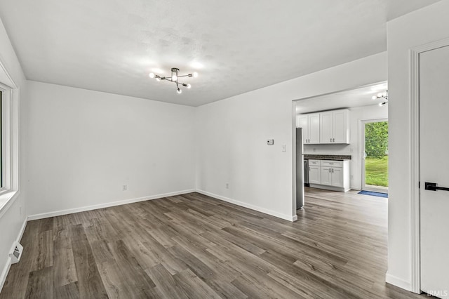 57372 Arabian Dr, Goshen, IN 46528 - empty room featuring wood finished floors and baseboards