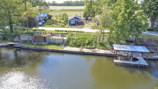 8020 N W Shafer Dr, Monticello, IN 47960 - dock area featuring a water view and boat lift