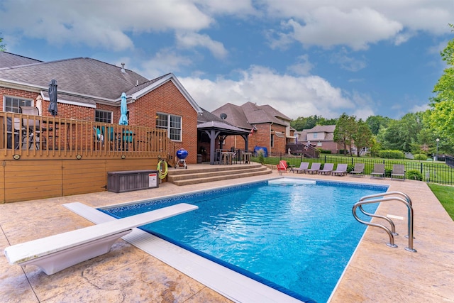 2534 Wheaton Dr, Evansville, IN 47725 - view of swimming pool with a gazebo, a patio area, a diving board, and a deck