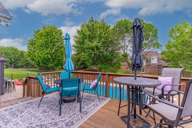 2534 Wheaton Dr, Evansville, IN 47725 - deck featuring outdoor dining space and a patio