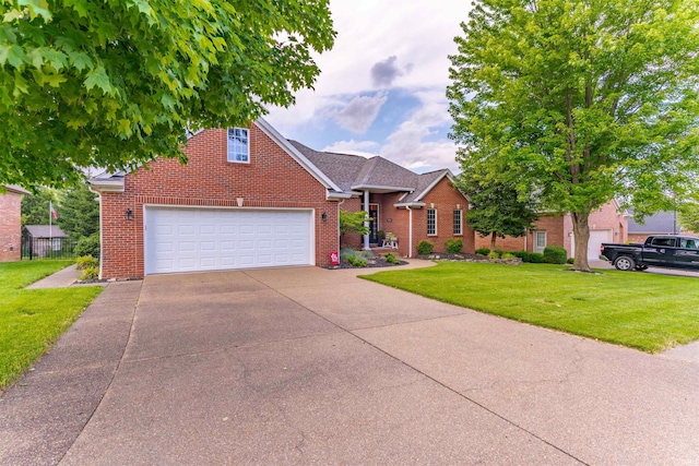 2534 Wheaton Dr, Evansville, IN 47725 - traditional-style home with brick siding, a front yard, concrete driveway, and an attached garage