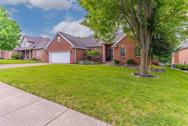 2534 Wheaton Dr, Evansville, IN 47725 - traditional-style house with brick siding, a garage, a front yard, and concrete driveway