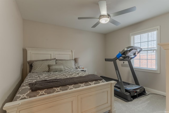 2534 Wheaton Dr, Evansville, IN 47725 - bedroom featuring light colored carpet, baseboards, and a ceiling fan