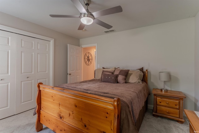 2534 Wheaton Dr, Evansville, IN 47725 - bedroom with light carpet, a closet, and a ceiling fan