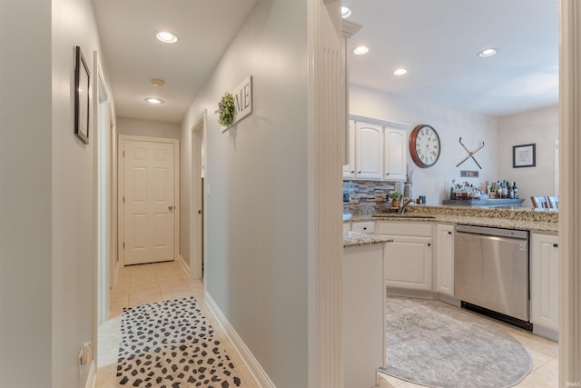 2534 Wheaton Dr, Evansville, IN 47725 - hall featuring light tile patterned floors, recessed lighting, and a sink