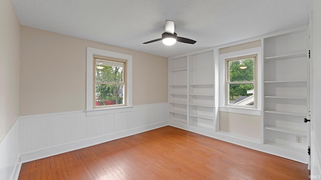 4112 Arlington Ave, Fort Wayne, IN 46807 - empty room with plenty of natural light, wainscoting, and built in features