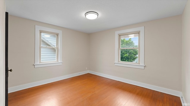 4112 Arlington Ave, Fort Wayne, IN 46807 - spare room featuring wood-type flooring and baseboards