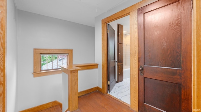 4112 Arlington Ave, Fort Wayne, IN 46807 - hall with wood finished floors, baseboards, and an upstairs landing