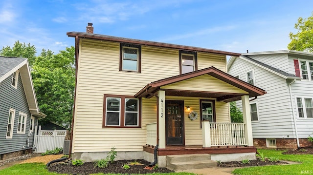 4112 Arlington Ave, Fort Wayne, IN 46807 - view of front of house with a porch and a chimney