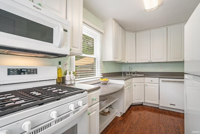 531 W Angela Blvd, South Bend, IN 46617 - kitchen with white appliances, white cabinets, dark wood-style flooring, a sink, and dark countertops