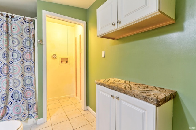 14 S Villa Dr, Evansville, IN 47714 - washroom with light tile patterned floors and baseboards