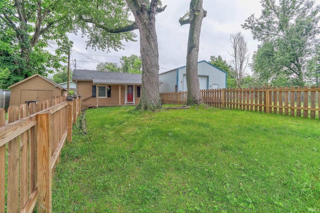 14 S Villa Dr, Evansville, IN 47714 - view of yard featuring a detached garage and an outdoor structure