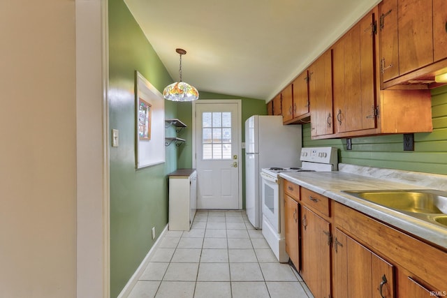 14 S Villa Dr, Evansville, IN 47714 - kitchen featuring white appliances, lofted ceiling, brown cabinets, light countertops, and light tile patterned floors