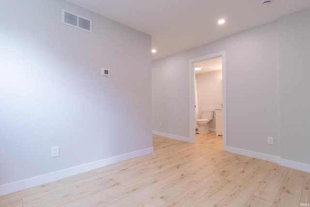 1026 S 35th St, South Bend, IN 46615 - empty room with recessed lighting, light wood-type flooring, and baseboards