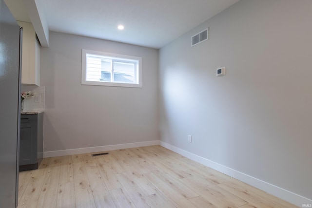 1026 S 35th St, South Bend, IN 46615 - unfurnished dining area with light wood-style flooring, recessed lighting, and baseboards