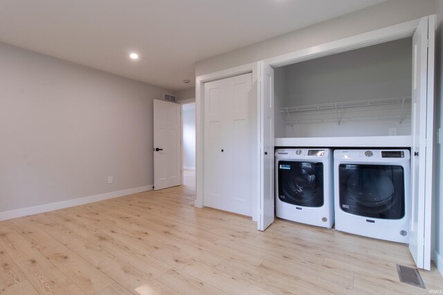 1026 S 35th St, South Bend, IN 46615 - laundry area with washer and clothes dryer, light wood-style flooring, recessed lighting, and baseboards