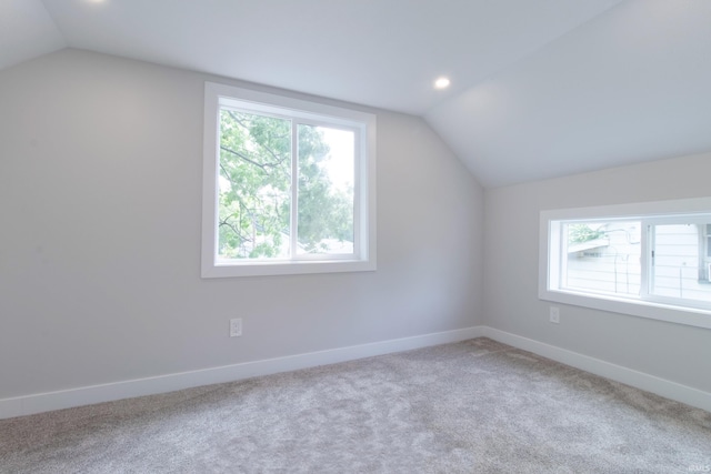 1026 S 35th St, South Bend, IN 46615 - additional living space featuring lofted ceiling, plenty of natural light, carpet, baseboards, and recessed lighting