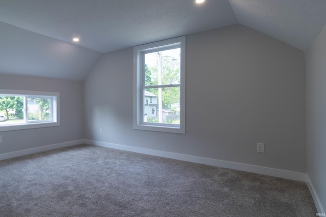 1026 S 35th St, South Bend, IN 46615 - additional living space featuring vaulted ceiling, carpet floors, baseboards, and recessed lighting
