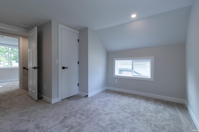 1026 S 35th St, South Bend, IN 46615 - additional living space with carpet flooring, baseboards, and lofted ceiling