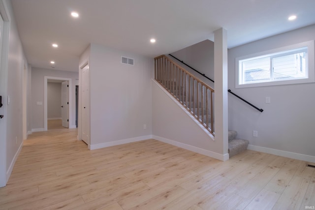 1026 S 35th St, South Bend, IN 46615 - staircase with recessed lighting, wood finished floors, and baseboards