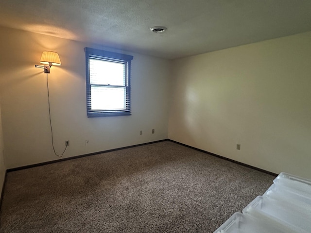 4218 Turf Ln, Fort Wayne, IN 46804 - unfurnished room featuring carpet floors, baseboards, and a textured ceiling