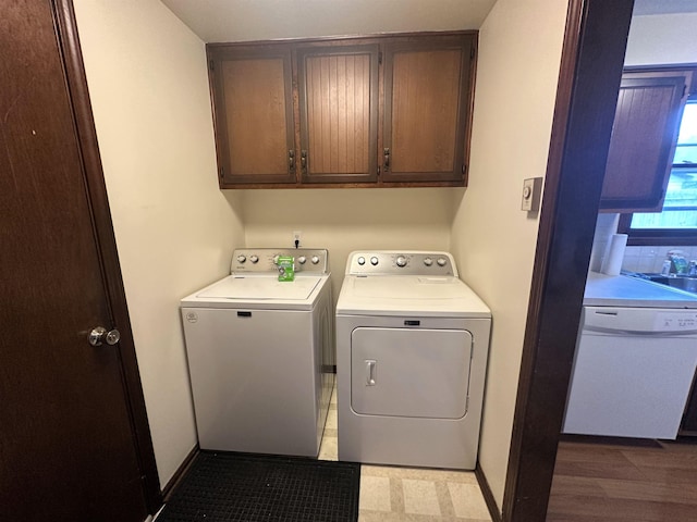 4218 Turf Ln, Fort Wayne, IN 46804 - laundry room with independent washer and dryer, cabinet space, and light flooring