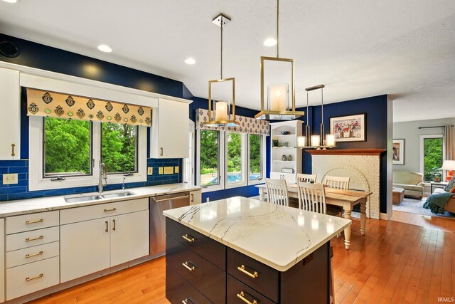 5905 Anjolea Way, Lafayette, IN 47905 - kitchen featuring a sink, dishwasher, tasteful backsplash, white cabinets, and recessed lighting