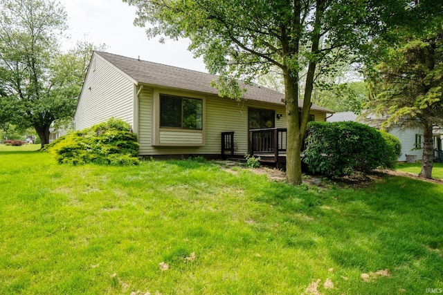 7914 Stonegate Pl, Fort Wayne, IN 46825 - back of house featuring a yard and a wooden deck