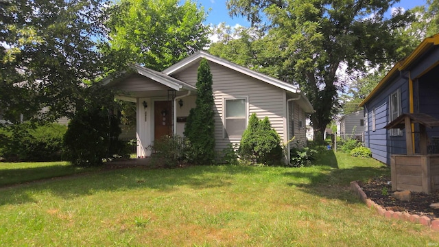 2405 Clara Ave, Fort Wayne, IN 46805 - view of front facade featuring a front lawn