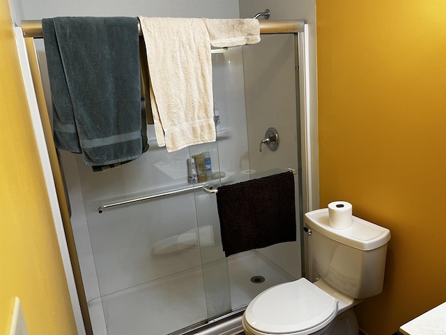 39 E Linn Rd, Bluffton, IN 46714 - bathroom featuring a stall shower and toilet