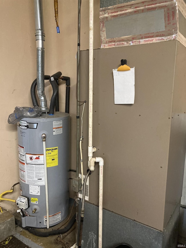 39 E Linn Rd, Bluffton, IN 46714 - utility room featuring gas water heater and heating unit