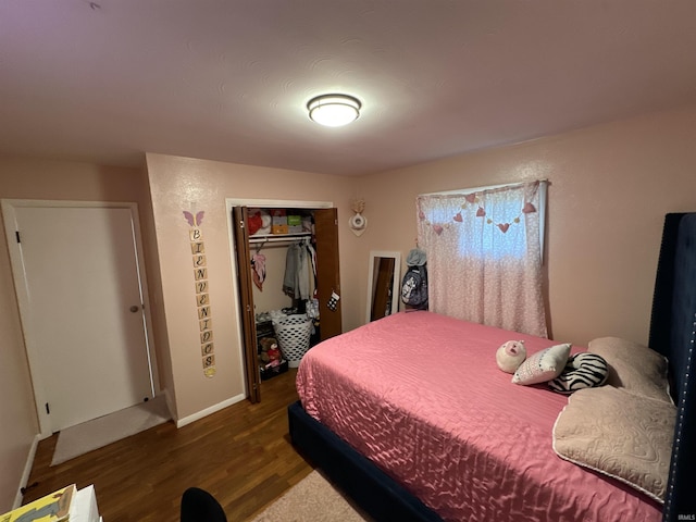 4340 Midway Rd, Elkhart, IN 46517 - bedroom featuring wood finished floors, a closet, and baseboards