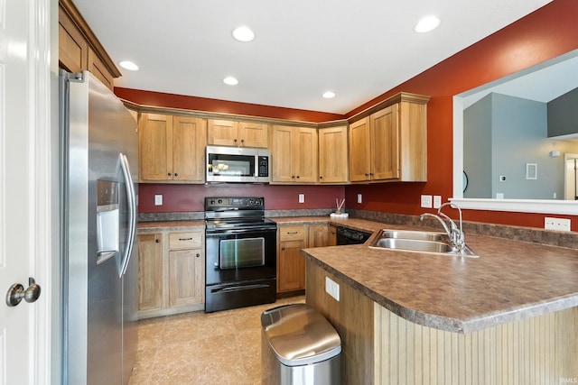 1328 Monte Carlo Dr, Huntertown, IN 46748 - kitchen featuring black appliances, a sink, a peninsula, recessed lighting, and light tile patterned floors