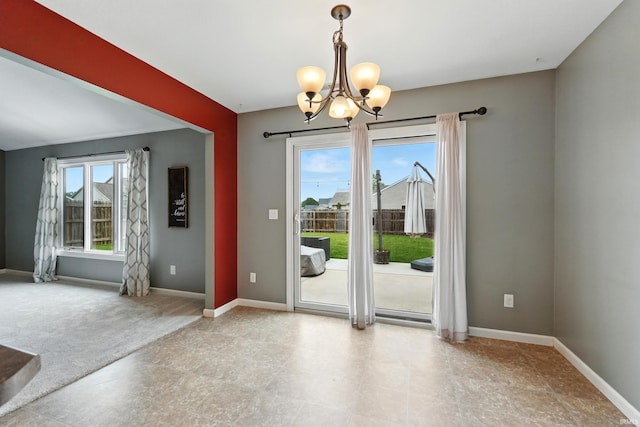 1328 Monte Carlo Dr, Huntertown, IN 46748 - unfurnished room with a chandelier and baseboards