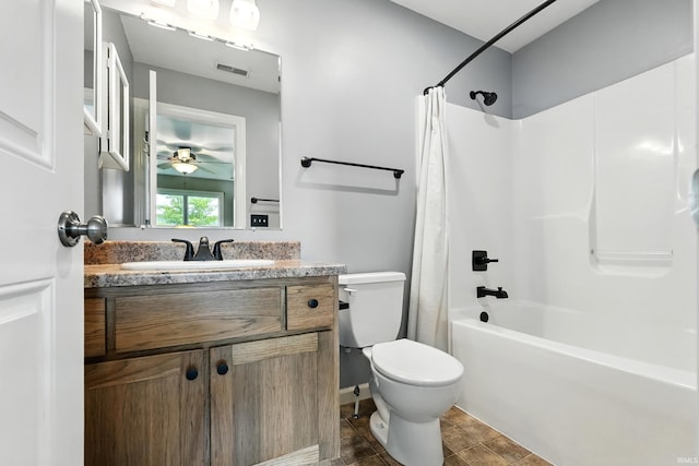1328 Monte Carlo Dr, Huntertown, IN 46748 - bathroom with toilet, vanity, shower / bath combo with shower curtain, and ceiling fan