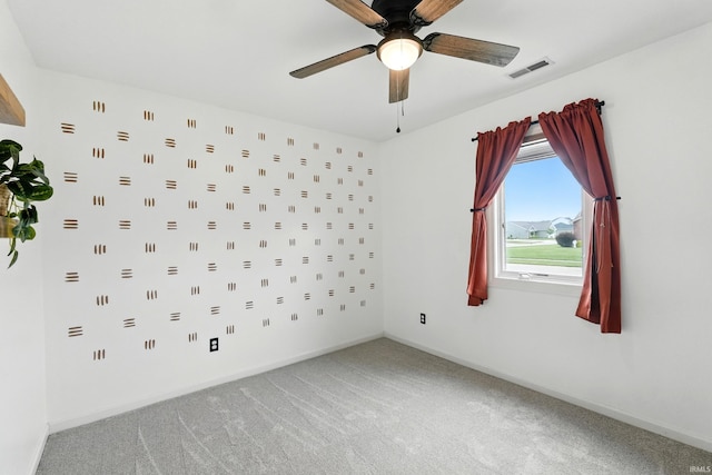 1328 Monte Carlo Dr, Huntertown, IN 46748 - carpeted empty room featuring ceiling fan and baseboards