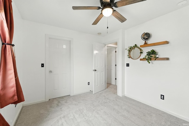 1328 Monte Carlo Dr, Huntertown, IN 46748 - unfurnished bedroom featuring carpet floors, baseboards, and ceiling fan