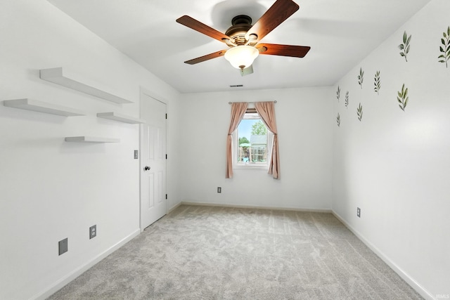 1328 Monte Carlo Dr, Huntertown, IN 46748 - carpeted empty room with ceiling fan and baseboards