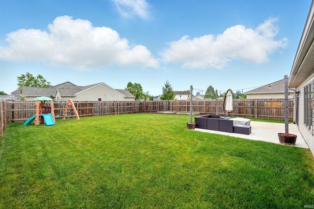 1328 Monte Carlo Dr, Huntertown, IN 46748 - view of yard featuring a patio area and a playground