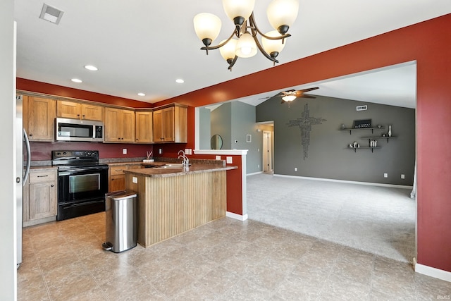 1328 Monte Carlo Dr, Huntertown, IN 46748 - kitchen with stainless steel microwave, electric range, vaulted ceiling, light carpet, and open floor plan