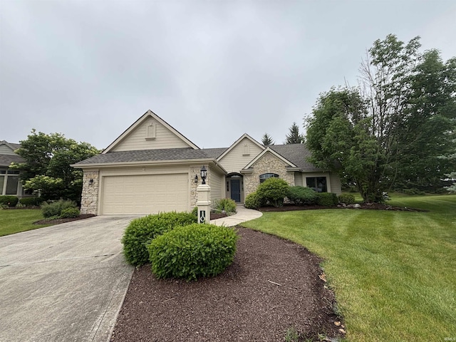 10403 Maple Springs Cv, Fort Wayne, IN 46845 - view of front of home featuring stone siding, a front yard, a garage, driveway, and a shingled roof