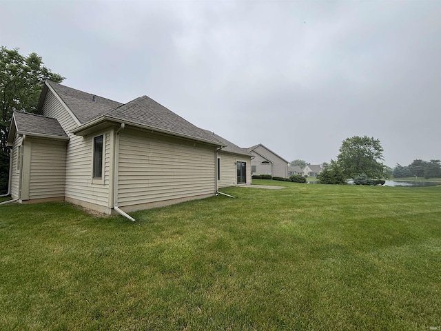 10403 Maple Springs Cv, Fort Wayne, IN 46845 - view of home's exterior featuring a yard and roof with shingles