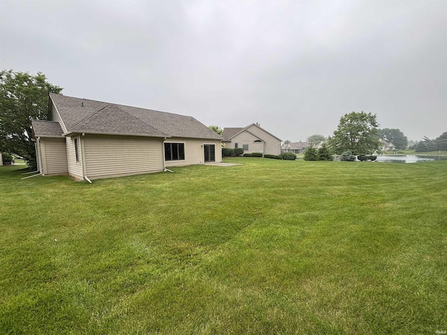 10403 Maple Springs Cv, Fort Wayne, IN 46845 - view of grassy yard featuring a water view