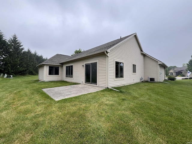 10403 Maple Springs Cv, Fort Wayne, IN 46845 - back of property with a lawn, a patio area, and cooling unit