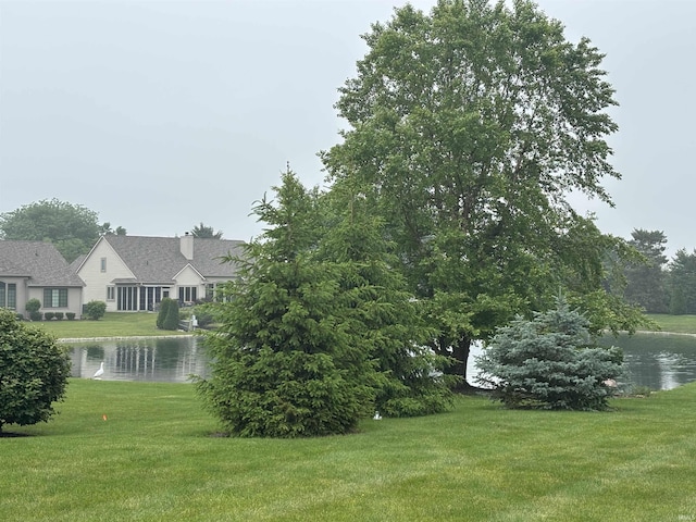 10403 Maple Springs Cv, Fort Wayne, IN 46845 - view of grassy yard with a water view
