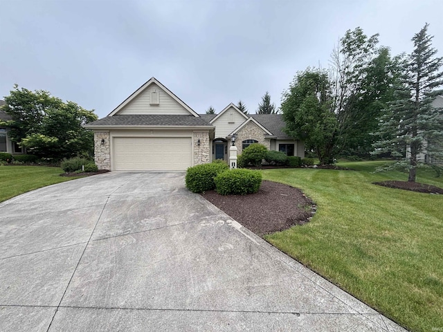 10403 Maple Springs Cv, Fort Wayne, IN 46845 - view of front of home featuring concrete driveway, a garage, and a front lawn