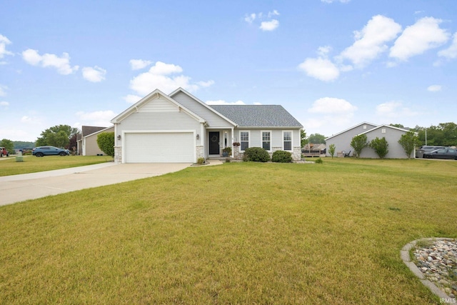 515 Cloudmont Dr, Osceola, IN 46561 - view of front of house with driveway, an attached garage, a front lawn, and stone siding