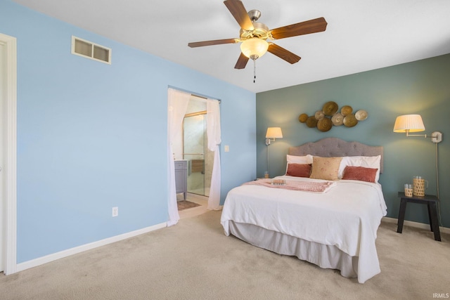 515 Cloudmont Dr, Osceola, IN 46561 - carpeted bedroom featuring baseboards, ensuite bathroom, and a ceiling fan