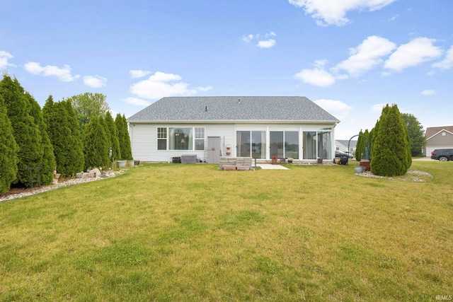 515 Cloudmont Dr, Osceola, IN 46561 - back of property with a sunroom, a yard, and cooling unit